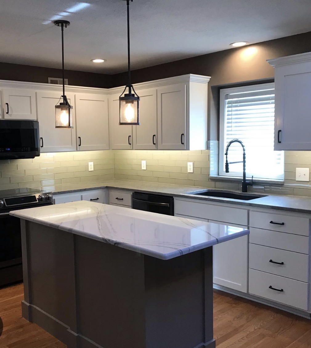 Farmhouse kitchen with butcher block island