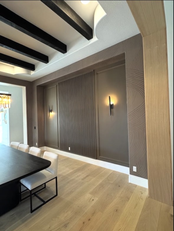 Brown slat wood accent wall in dining room